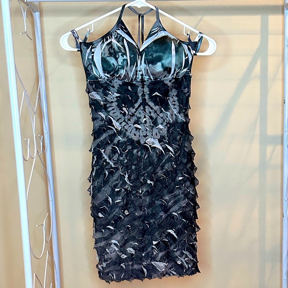 Multicolored fun party dress for Papaya with peace sign tie dye and ruffles.